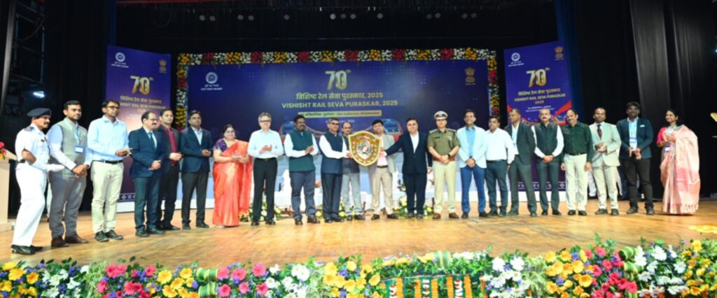 Visakhapatnam Vizagvision: EAST COAST RAILWAY CELEBRATES VISHISHT RAIL SEVA PURASKAR-2025 WITH RECOGNITION OF OUTSTANDING RAILWAY EMPLOYEES.Waltair Division shared overall Efficiency Shield with Sambalpur East Coast Railway marked the grand celebration of Vishisht Rail Seva Puraskar-2025 today at the Railway Auditorium in Bhubaneswar, honouring the exceptional service and dedication of its employees. The event saw the felicitation of 49 Railway employees for their outstanding performance, as well as the distribution of several efficiency shields to different divisions and stations across the region.*Key Highlights of the Event:49 Railway Employees Felicitated: In recognition of exemplary service, integrity and professional excellence: 49 Railway employees from different departments and divisions of East Coast Railway were conferred with the prestigious Vishisht Rail Seva Puraskar-2025. The awardees include officers and staff from Operating, Engineering, Mechanical, Electrical, Signal & Telecommunication, Commercial, Security and other frontline departments, who distinguished themselves through outstanding performance, innovation, leadership, safety initiatives and sustained contribution to organisational efficiency. The awards were presented by Shri Parmeshwar Funkwal, General Manager, East Coast Railway, acknowledging their commitment, devotion to duty and significant role in achieving organisational objectives.*Overall Efficiency Shield Awarded to Waltair & Sambalpur Division Jointly* : In a significant achievement, Waltair & Sambalpur Divisions were jointly honored with the Overall Efficiency Shield, recognizing their exemplary performance in maintaining high standards of operational efficiency, safety and service delivery. *Waltair Division bagged 9 efficiency shields* received by Divisional Railway Manager Shri Lalit Bohra and respective Branch Officers from Waltair Division. Gracing the occasion, Shri Parmeshwar Funkwal, General Manager of East Coast Railway, congratulated the Railway personnel for their exceptional commitment and 24/7 efforts in fulfilling their responsibilities. He emphasized the importance of teamwork and continued dedication in achieving operational excellence.The ceremony was further elevated by the presence of Smt. Kavita Funkwal, President of East Coast Railway Women’s Welfare Organisation, Shri B.S.K. Rajkumar, Additional General Manager, along with other Principal Heads of Departments and senior officials of ECoR. Shri A.K. Chaturvedi, Senior Deputy General Manager, welcomed the guests and highlighted significance of the awards on the occasion.The Vishisht Rail Seva Puraskar-2025 ceremony was a sincere recognition of the hard work and dedication of unsung heroes of East Coast Railway, highlighting their important role in ensuring the smooth and efficient operation of the Railway System.
